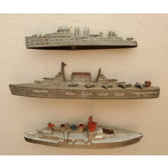 3 vintage metal toy military ships, 2 Tootsie Toy, an aircraft carrier, etc.