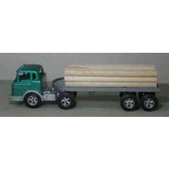 Hubley Green Tractor Trailer with 9 Lumber boards, 