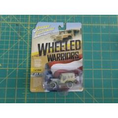 New in Package Johnny Lightning Wheeled Warriors Jeep with Snow 1/64