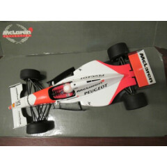 Formula 1 model car, Martin Brundle; McLaren Peugeot 1994, 1:18, boxed
