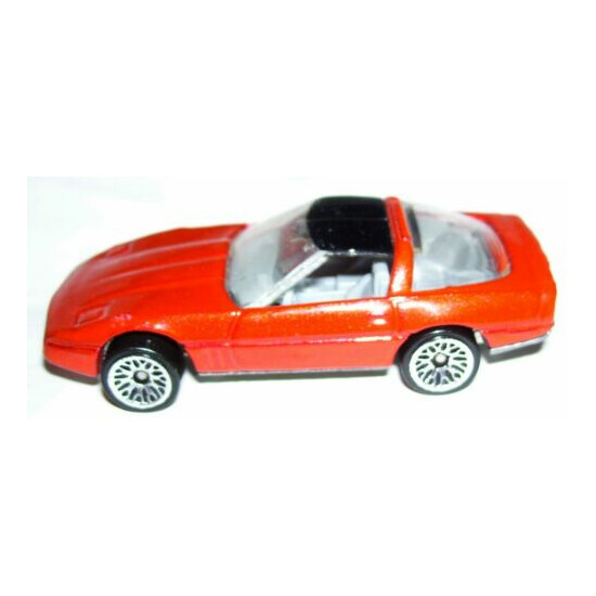 1:64 1982 Malaysia Hot wheels diecast 80s corvette metallic red w/ black roof {1}