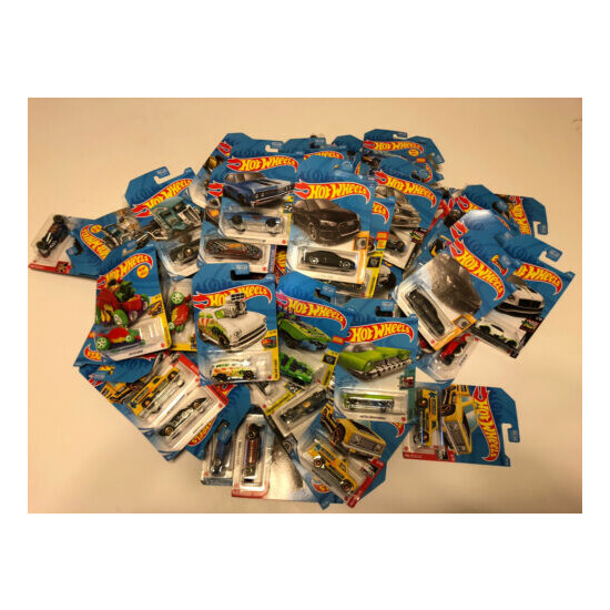 63 Count Assorted Hot Wheels  {1}