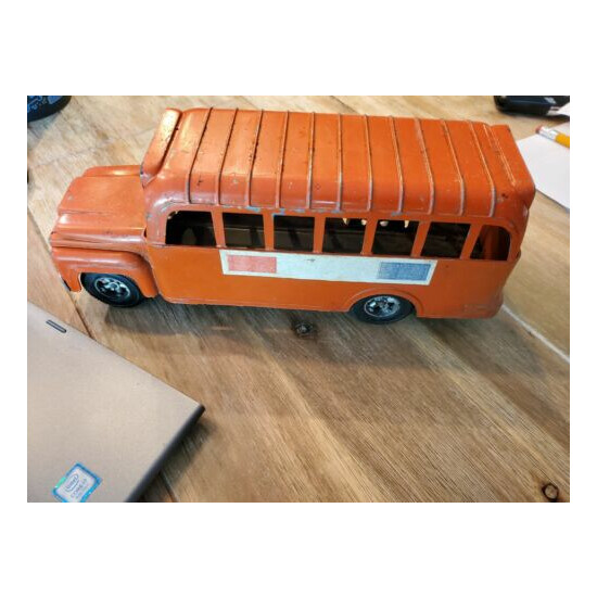 Hubley Bus, Orange, stamped 493 9 1/4 inches long  {1}