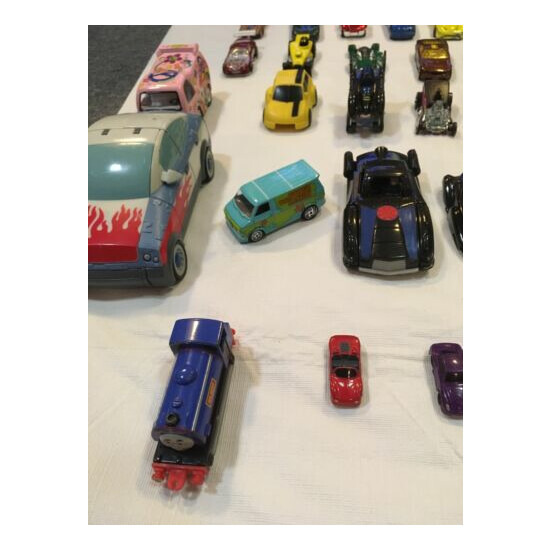 Die Cast Cars, transformers, super heroe cars, lot of 65 cars {4}
