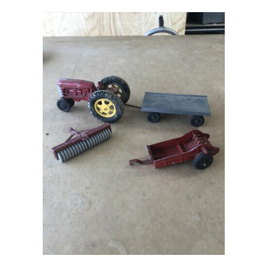 Vintage Hubley Toy Tractor with Attachments {1}