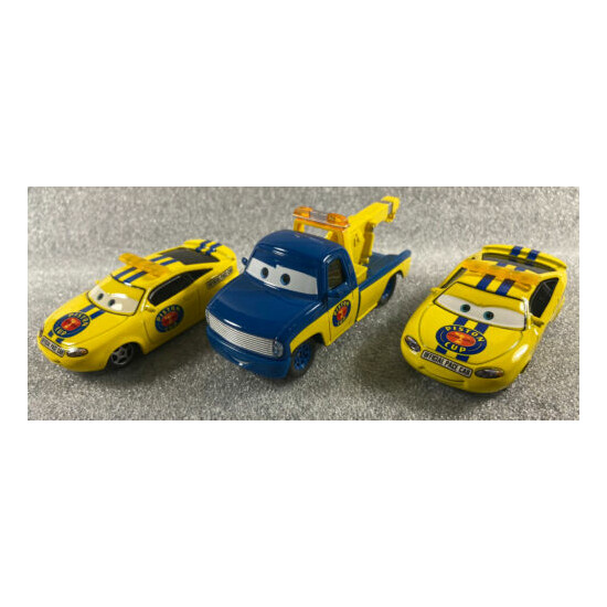 Disney Pixar Cars Piston Cup Charlie Checker Pace Car (2 Variants) & Tow Truck {1}