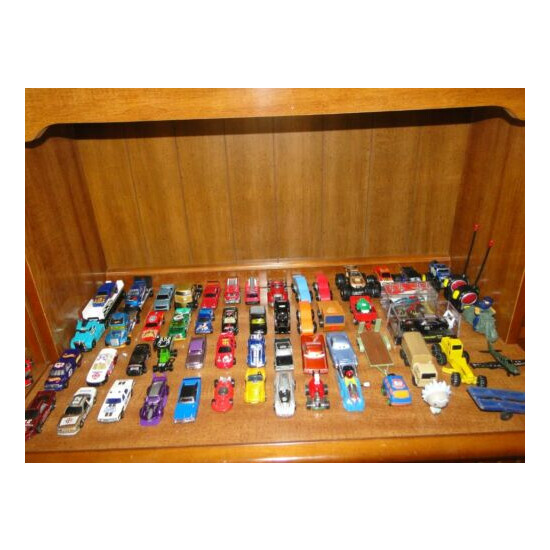 Large Toy car lot of Hot Wheels and other misc. toys and mini walkie-talkies {1}