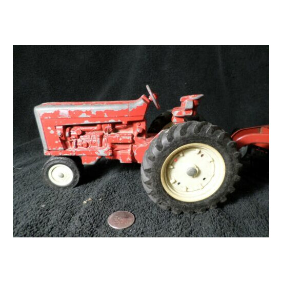 Vintage Ertl Red International Harvester Tractor w/ a working Hay Rake {1}